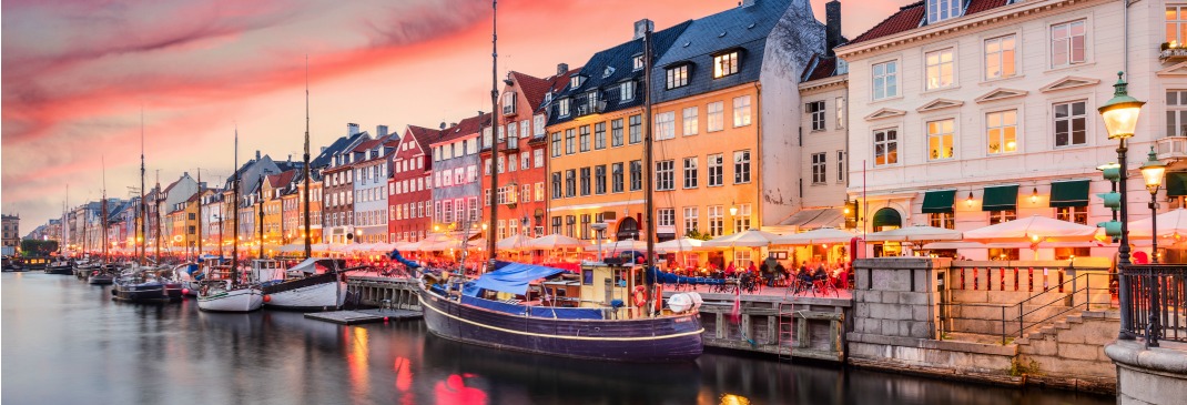 The sun sets over Nyhavn Canal